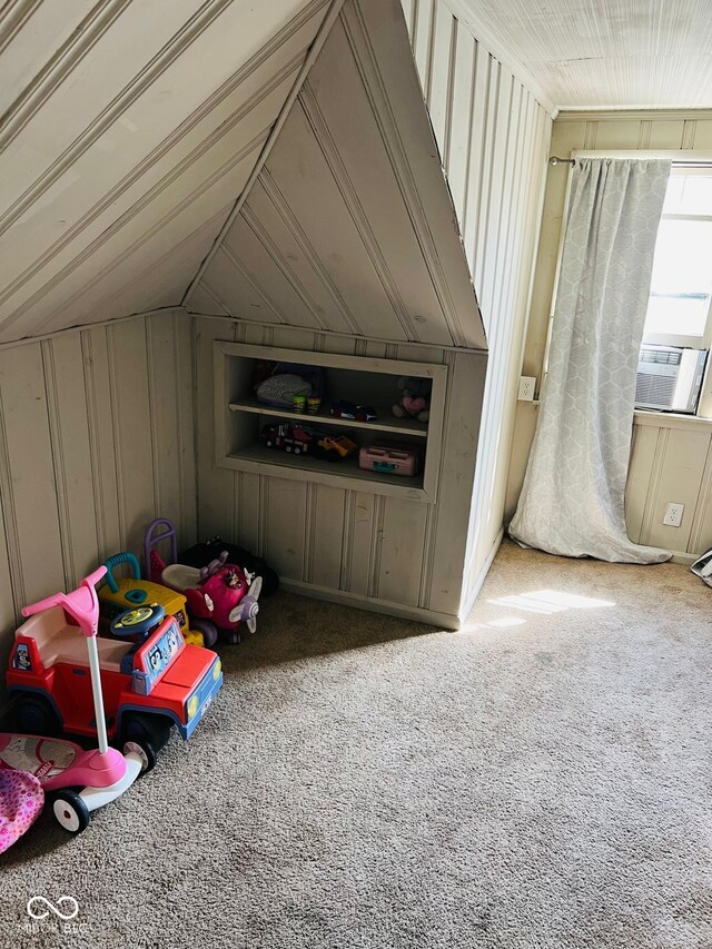 4850 E University Ave, Indianapolis, IN 46201 - additional living space featuring carpet flooring, vaulted ceiling, and cooling unit