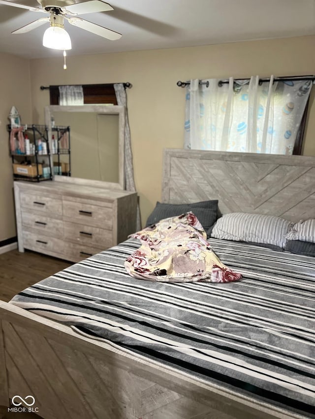 4850 E University Ave, Indianapolis, IN 46201 - bedroom featuring dark wood-type flooring and ceiling fan