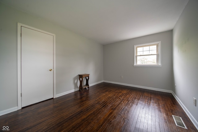 5388 W Hazelrigg Rd, Thorntown, IN 46071 - spare room featuring wood-type flooring and baseboards