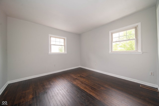 5388 W Hazelrigg Rd, Thorntown, IN 46071 - empty room with dark wood-style floors and baseboards