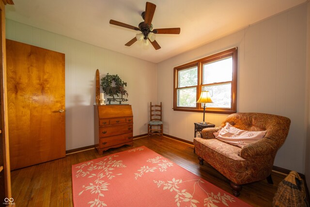 5388 W Hazelrigg Rd, Thorntown, IN 46071 - living area with wood finished floors, ceiling fan, and baseboards