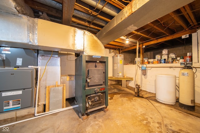 5388 W Hazelrigg Rd, Thorntown, IN 46071 - unfinished basement with electric water heater, a water softener, and heating unit