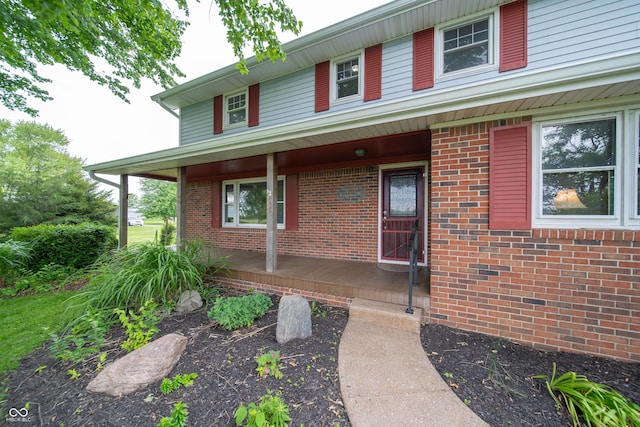 5388 W Hazelrigg Rd, Thorntown, IN 46071 - view of front facade with covered porch and brick siding