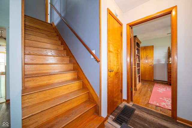 5388 W Hazelrigg Rd, Thorntown, IN 46071 - stairway featuring wood finished floors and baseboards