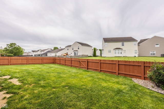 view of yard featuring a residential view