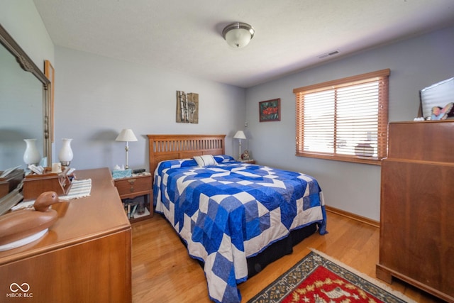 188 Bay Ridge Dr, Pendleton, IN 46064 - bedroom with wood finished floors and baseboards