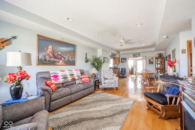 188 Bay Ridge Dr, Pendleton, IN 46064 - living area featuring light wood-style floors, ceiling fan, a raised ceiling, and recessed lighting