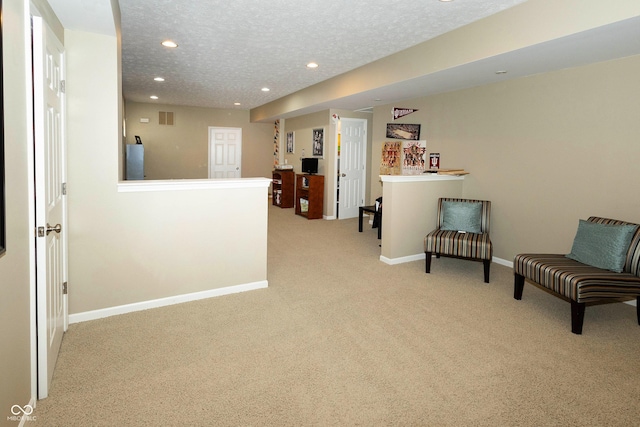 11727 Wedgeport Ln, Fishers, IN 46037 - living area featuring carpet flooring, recessed lighting, baseboards, a bar, and a textured ceiling