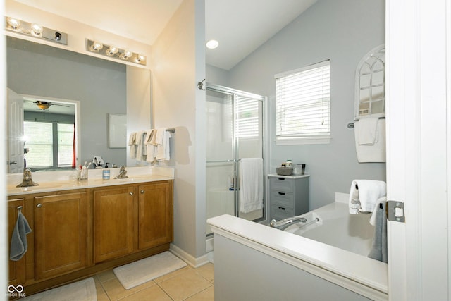 11727 Wedgeport Ln, Fishers, IN 46037 - bathroom featuring double vanity, a shower stall, tile patterned flooring, and lofted ceiling