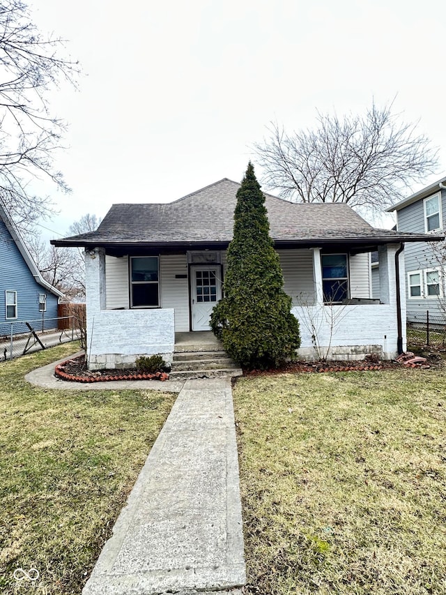 834 N Temple Ave, Indianapolis, IN 46201 - view of front of property with covered porch and a shingled roof