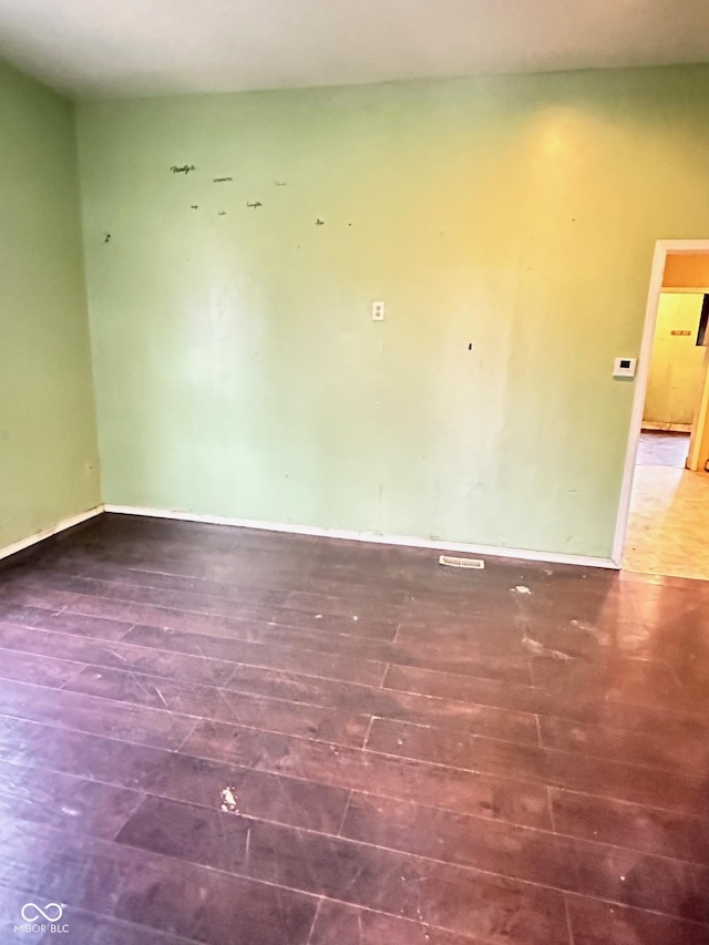834 N Temple Ave, Indianapolis, IN 46201 - empty room featuring wood finished floors and baseboards