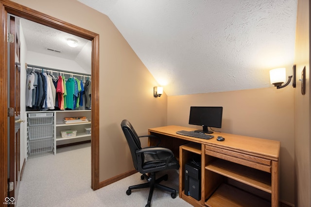6575 Robin Hood Dr, Indianapolis, IN 46227 - carpeted home office with a textured ceiling, lofted ceiling, and baseboards
