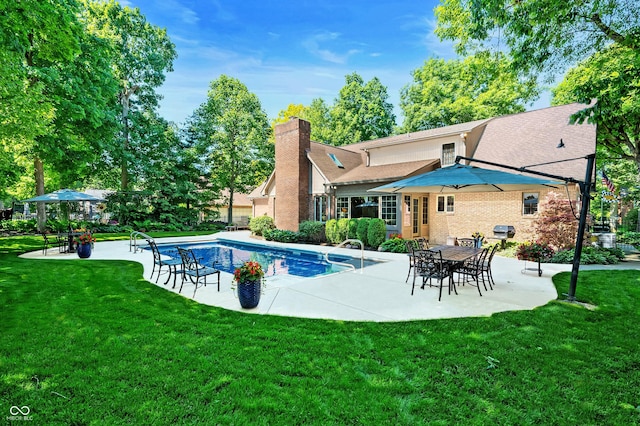 6575 Robin Hood Dr, Indianapolis, IN 46227 - outdoor pool featuring a patio and a lawn