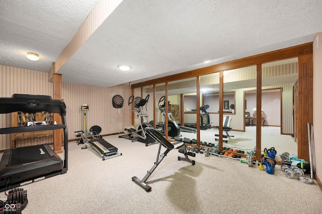 6575 Robin Hood Dr, Indianapolis, IN 46227 - workout area with a textured ceiling and wallpapered walls