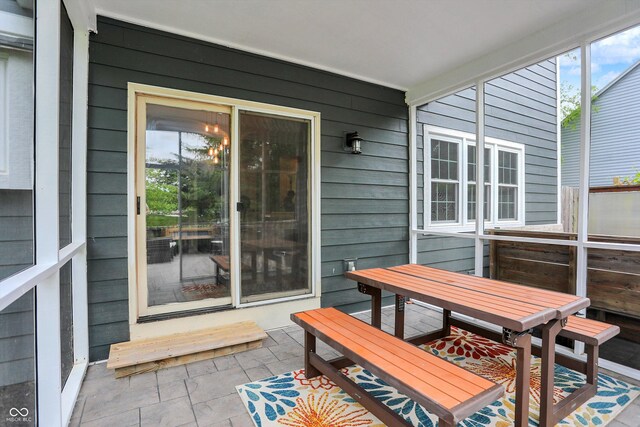exterior space featuring outdoor dining area and healthy amount of natural light