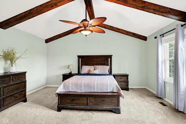 carpeted bedroom featuring baseboards and a ceiling fan