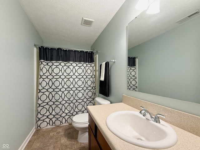 8644 N Deer Crossing Blvd, Mccordsville, IN 46055 - full bathroom with toilet, vanity, a shower with curtain, a textured ceiling, and stone finish flooring