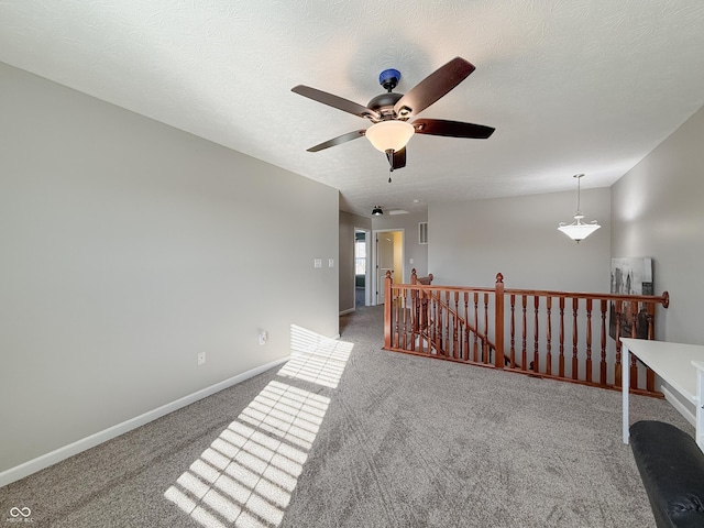 8644 N Deer Crossing Blvd, Mccordsville, IN 46055 - carpeted spare room featuring ceiling fan and baseboards