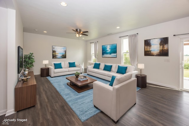 living room featuring dark wood-type flooring, recessed lighting, ceiling fan, and baseboards