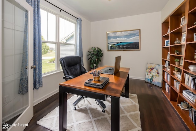 office featuring wood finished floors and baseboards