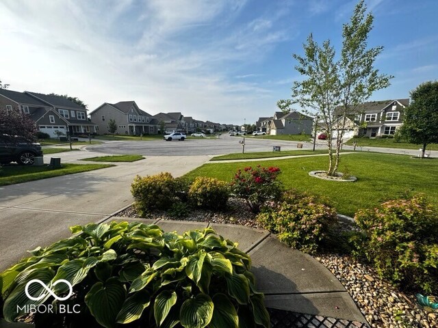 2780 Cormorant Dr, Greenwood, IN 46143 - view of grassy yard featuring a residential view
