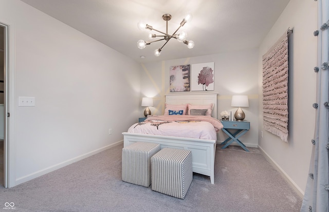 carpeted bedroom with a chandelier and baseboards