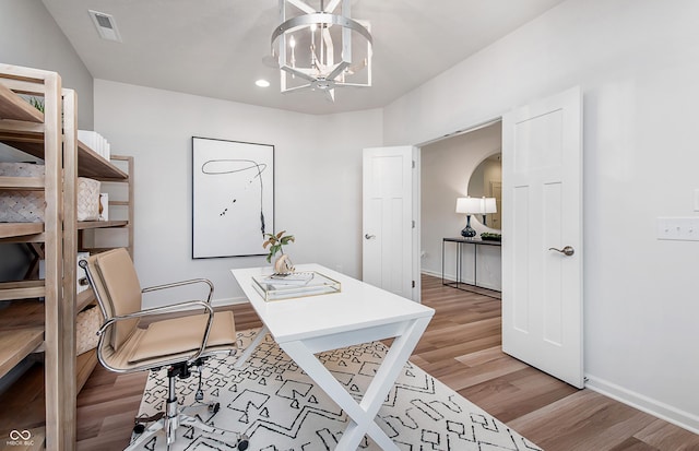 home office with light wood-style flooring, a chandelier, baseboards, and recessed lighting