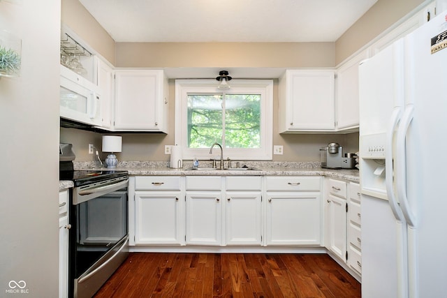 1940 Stringtown Pike, Cicero, IN 46034 - kitchen featuring white appliances, a sink, white cabinetry, and dark wood-type flooring
