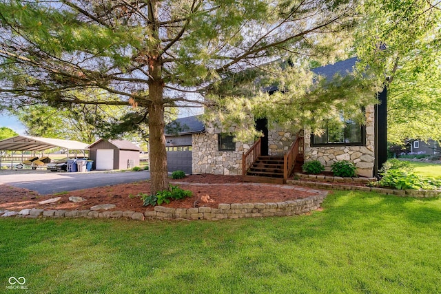 1940 Stringtown Pike, Cicero, IN 46034 - obstructed view of property with stone siding, asphalt driveway, a front yard, and a garage
