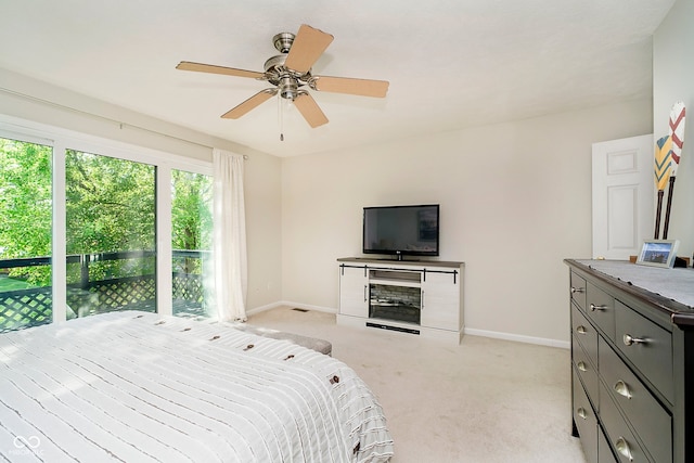1940 Stringtown Pike, Cicero, IN 46034 - bedroom with baseboards, light colored carpet, and a ceiling fan