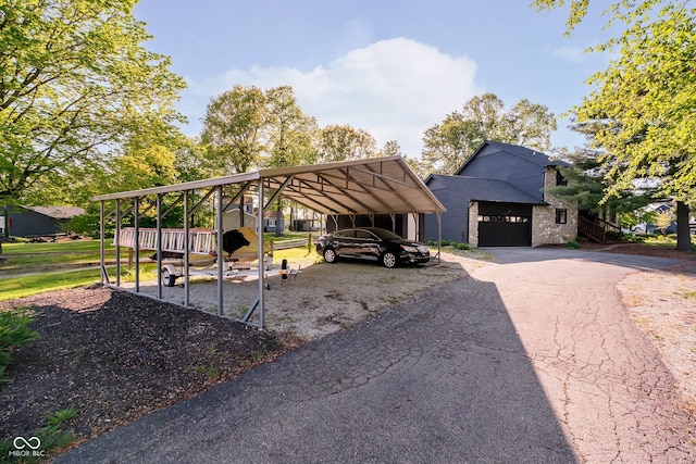 1940 Stringtown Pike, Cicero, IN 46034 - view of parking featuring driveway, a detached carport, and a garage