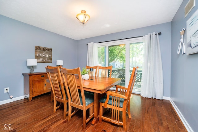 1940 Stringtown Pike, Cicero, IN 46034 - dining room with dark wood-style floors and baseboards