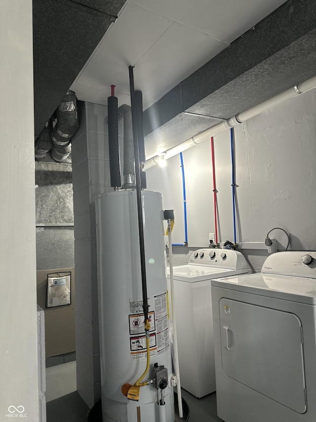 8417 S Sherman Dr, Indianapolis, IN 46237 - clothes washing area featuring gas water heater and washer and dryer