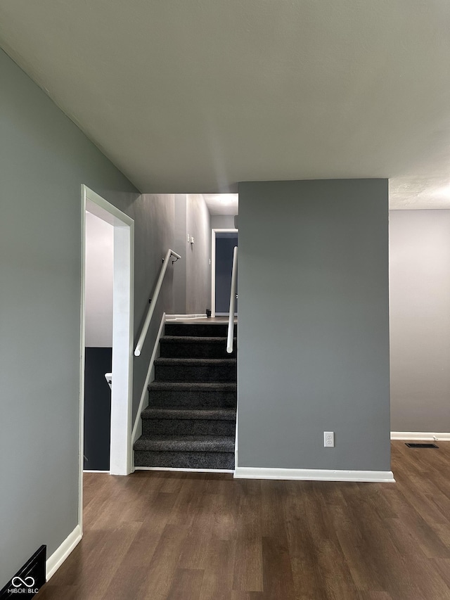 8417 S Sherman Dr, Indianapolis, IN 46237 - staircase with wood finished floors and baseboards
