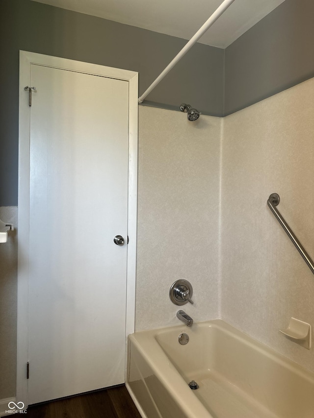 8417 S Sherman Dr, Indianapolis, IN 46237 - full bathroom featuring bathing tub / shower combination and wood finished floors