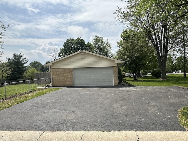 8417 S Sherman Dr, Indianapolis, IN 46237 - garage featuring asphalt driveway