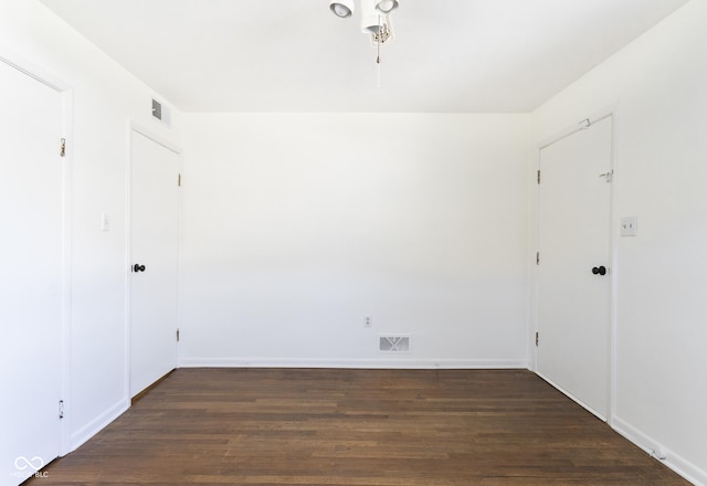 370 N Bazil Ave, Indianapolis, IN 46219 - empty room featuring wood finished floors and baseboards