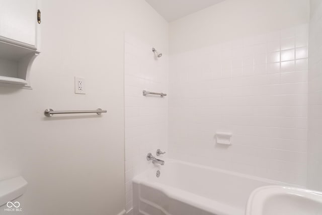 370 N Bazil Ave, Indianapolis, IN 46219 - bathroom featuring bathtub / shower combination and toilet