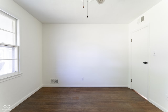 370 N Bazil Ave, Indianapolis, IN 46219 - unfurnished room featuring dark wood finished floors, a ceiling fan, and baseboards