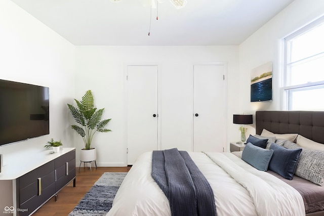 370 N Bazil Ave, Indianapolis, IN 46219 - bedroom with dark wood finished floors