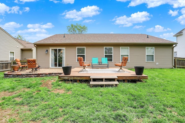 back of property featuring a deck