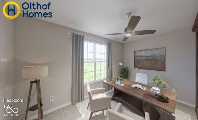carpeted office with baseboards and a ceiling fan
