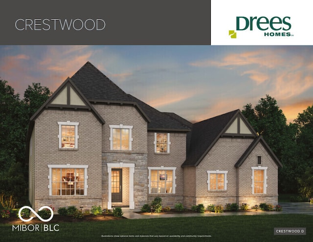 9602 Fall Creek Rd, Indianapolis, IN 46256 - view of front of house featuring brick siding, a yard, and a shingled roof