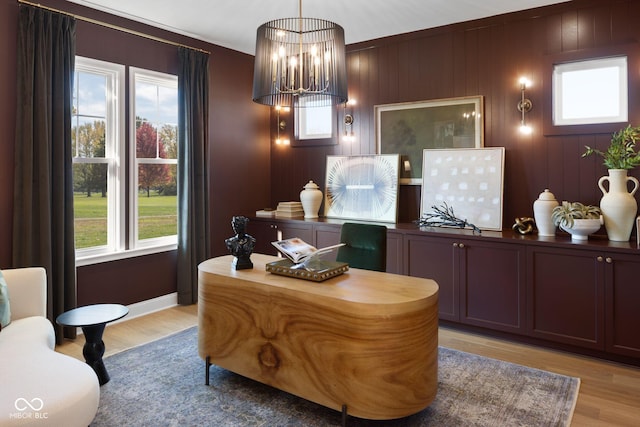 9602 Fall Creek Rd, Indianapolis, IN 46256 - office area featuring light wood-type flooring, a chandelier, and baseboards