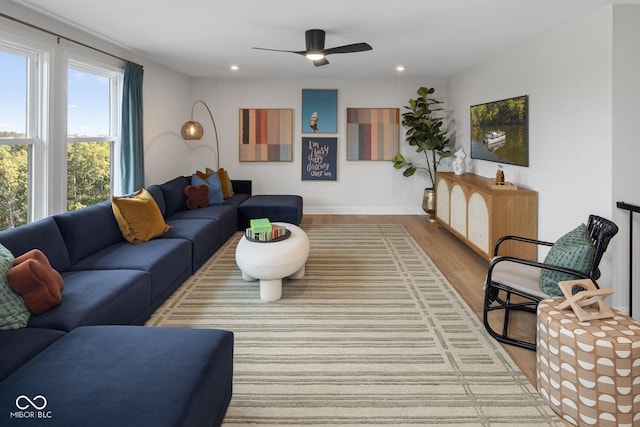 9602 Fall Creek Rd, Indianapolis, IN 46256 - living room featuring wood finished floors, ceiling fan, recessed lighting, and baseboards