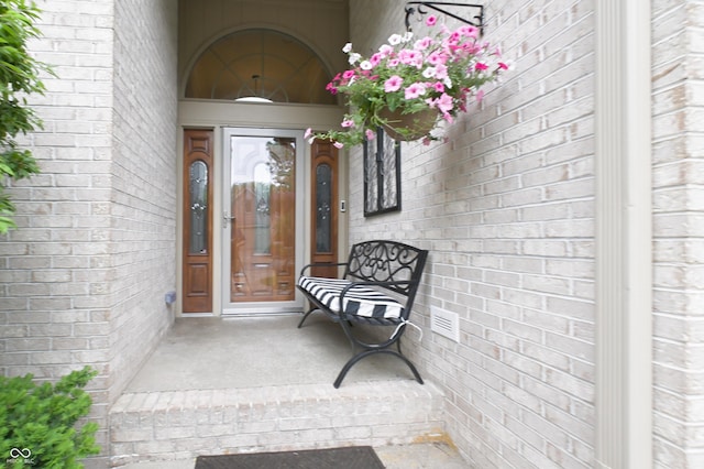 1614 Rosebud Ln Unit 83, Greenwood, IN 46143 - doorway to property with brick siding