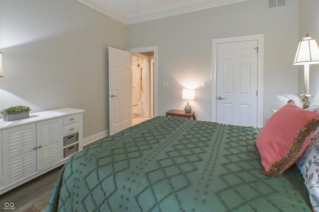 1614 Rosebud Ln Unit 83, Greenwood, IN 46143 - bedroom featuring crown molding and wood finished floors