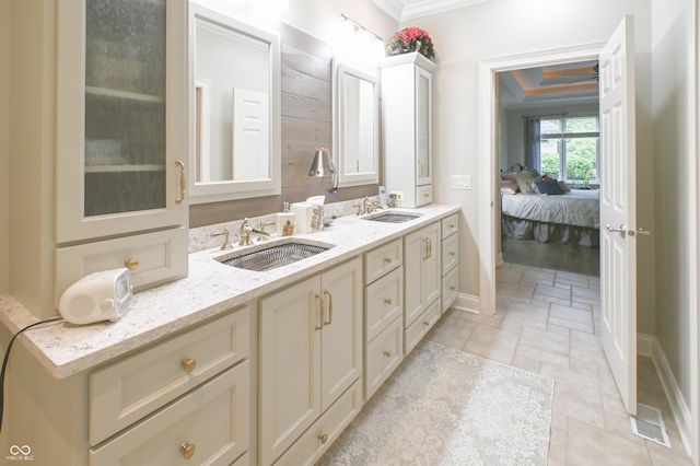 1614 Rosebud Ln Unit 83, Greenwood, IN 46143 - full bathroom featuring crown molding, double vanity, and baseboards