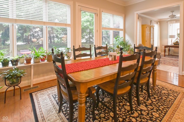 1614 Rosebud Ln Unit 83, Greenwood, IN 46143 - dining area with ornamental molding and light wood-style floors