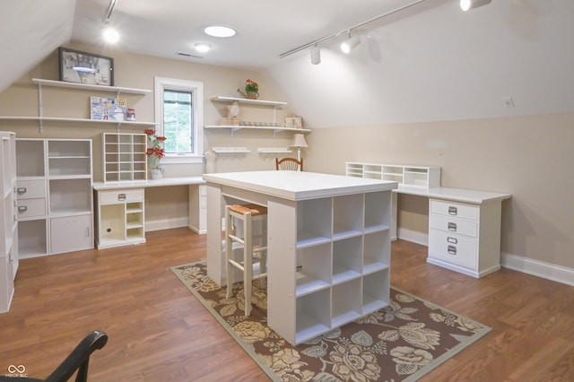 1614 Rosebud Ln Unit 83, Greenwood, IN 46143 - spacious closet featuring lofted ceiling and wood finished floors